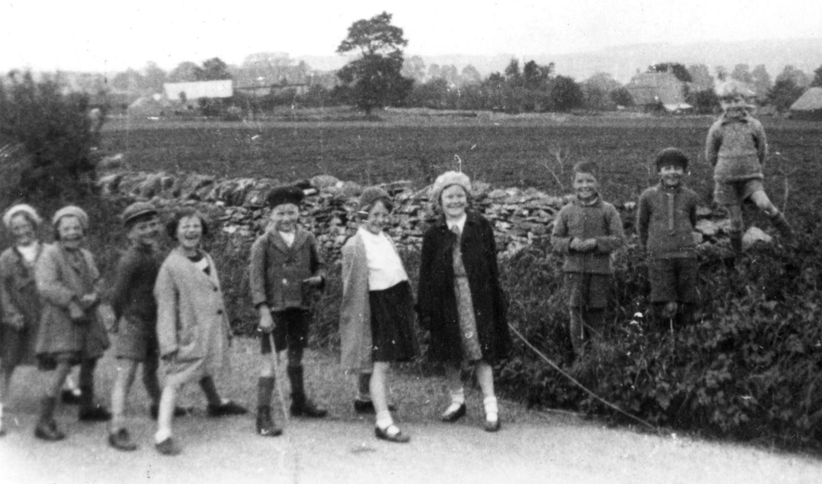 Group photo of Idbury School children out and about on village survey duty